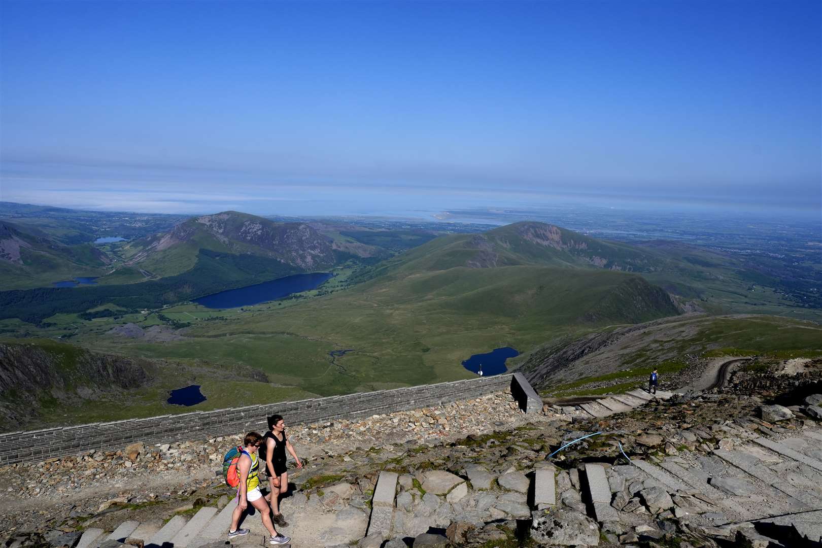 The cooler temperatures at the summit of Yr Wyddfa will have been welcomed by walkers in Snowdonia (Nick Potts/PA)