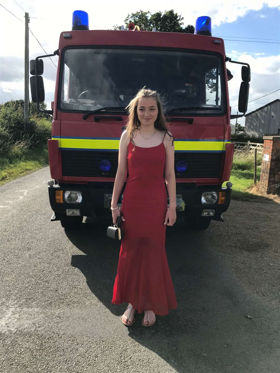 Holly Sutton, who went to her prom in this fire engine. Picture submitted