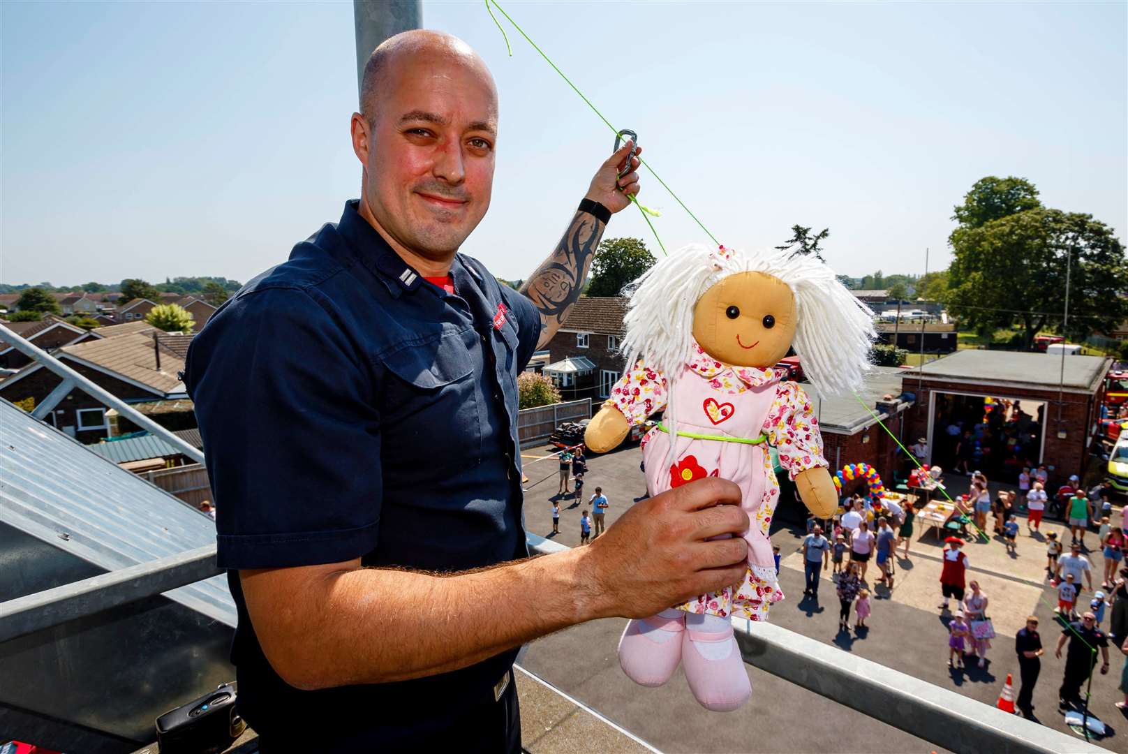 Crew manager Luke Waters demonstrating emergency evacuation with soft toys. Picture: Mark Bullimore