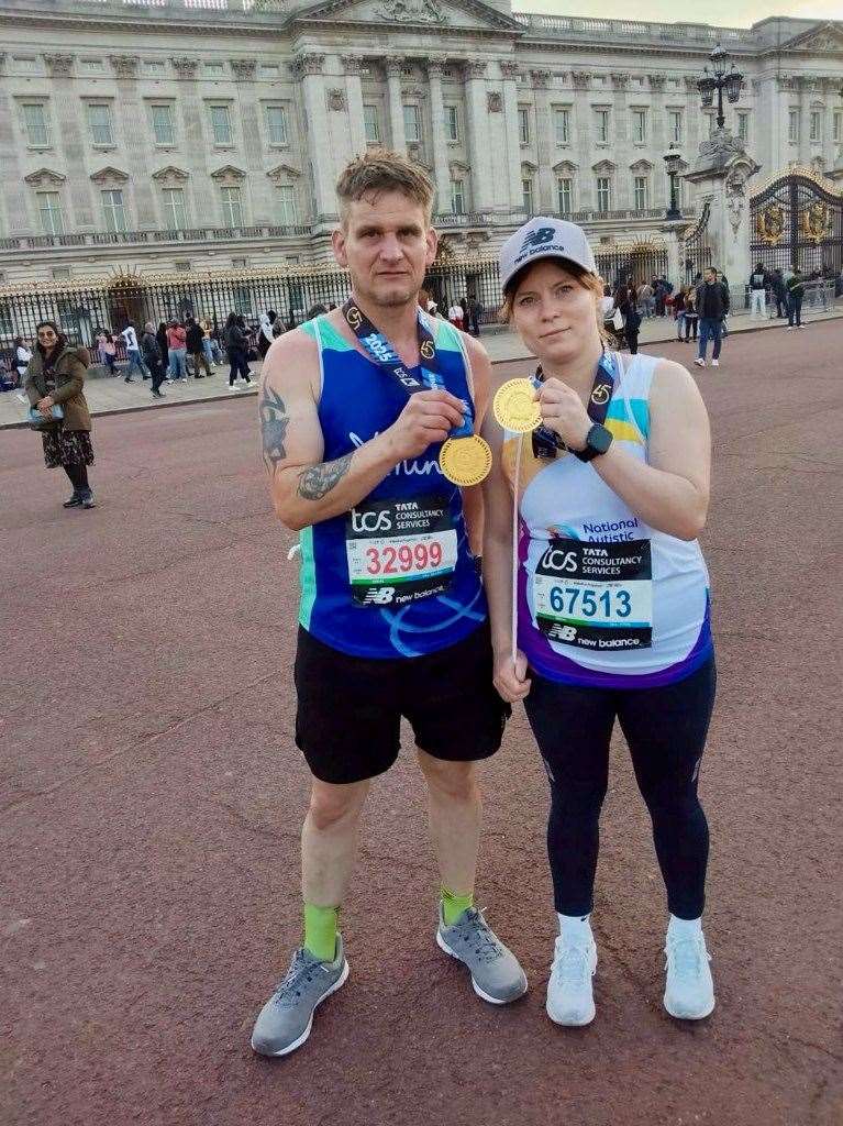 Taila Taylor, right, with her dad who ran for the Mind charity. Picture submitted