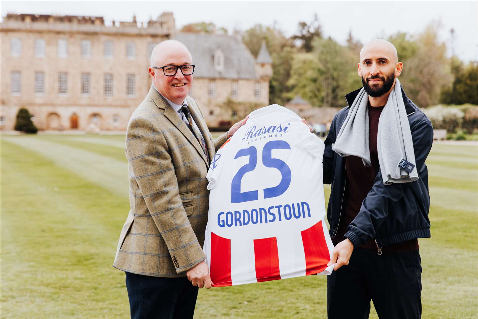 Gordonstoun Principal, Peter Green, with Gulf United FC director, Mohamed Al Rais, a former pupil at the school (Gordonstoun/PA)