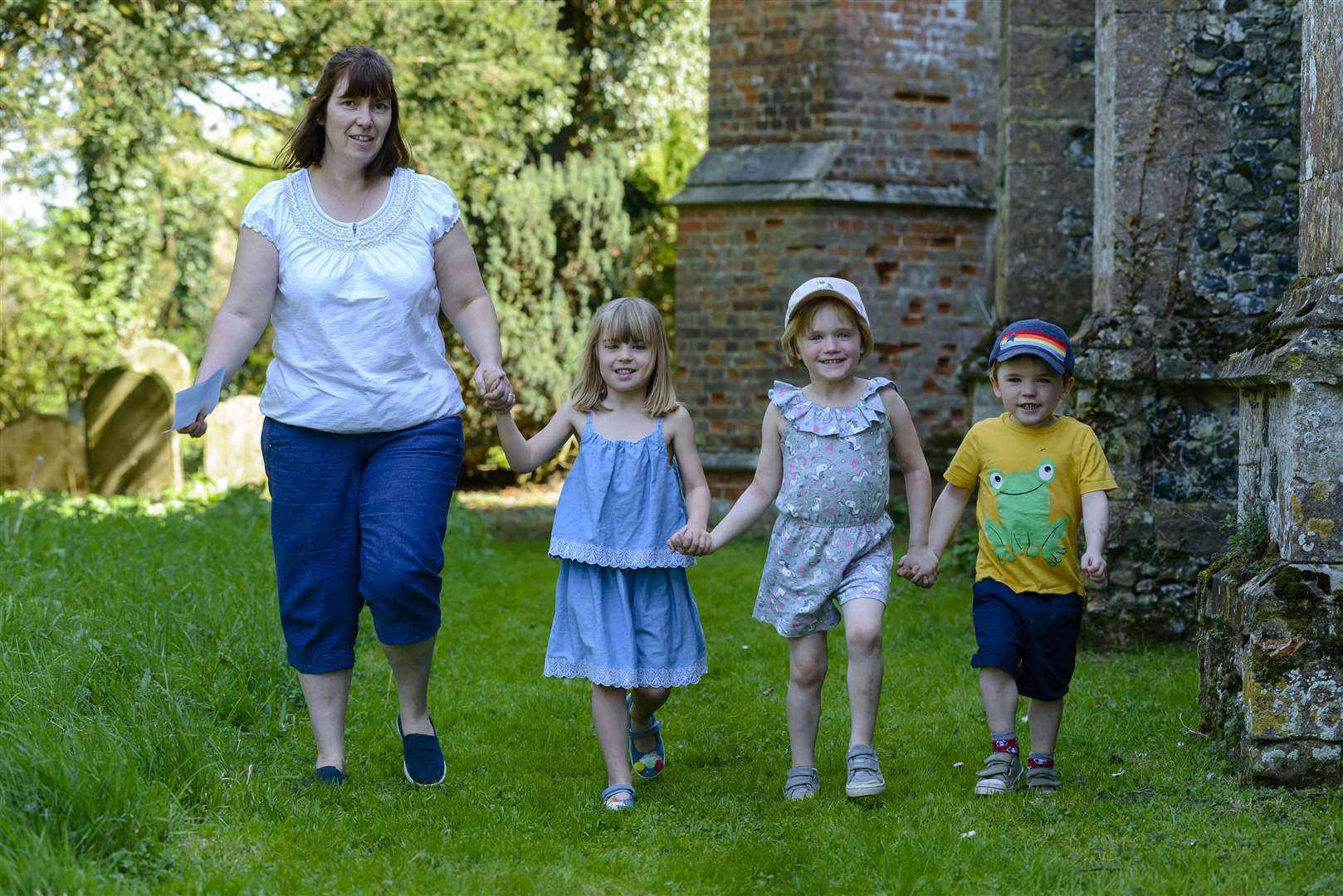 Easter Egg Hunt at Mellis church St Mary the Virgin, pictured from left Julie Muttock, Poppy Hubbard, Edith Hickson and George Hickson...Credit: Mark Bullimore Photography. (8912463)