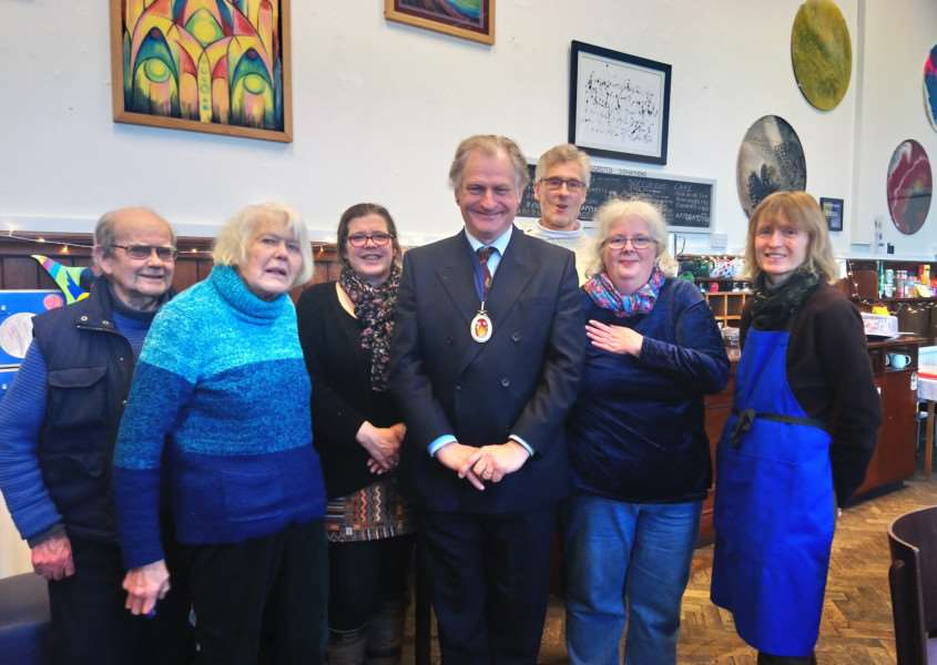 The High Sheriff of Suffolk Geoffrey Probert (centre) visits directors and volunteers at The Bank, Eye. Photo: Zach Ward.