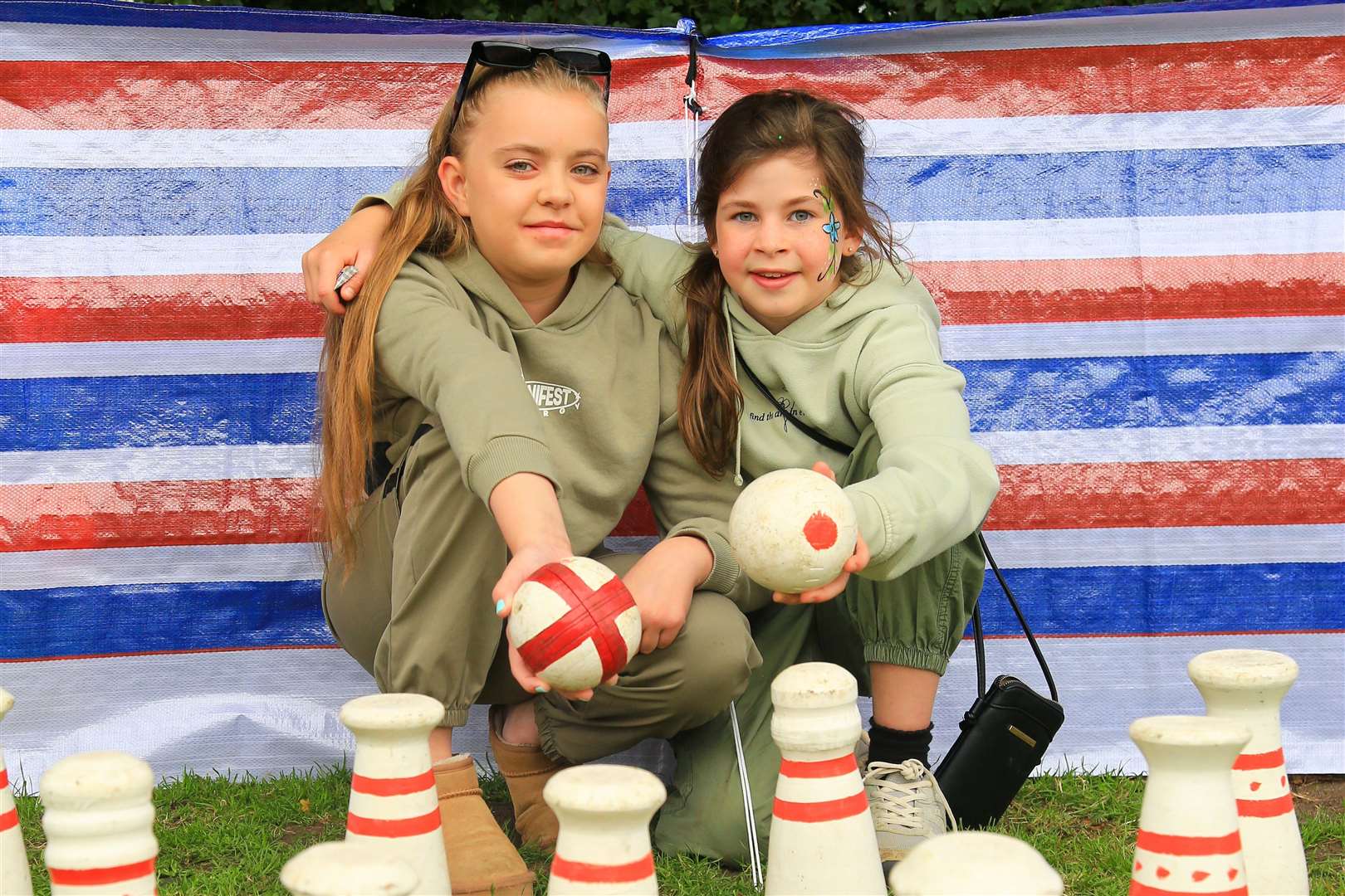 Pippa and Lily, both 10-years-old, enjoying the old school games. Picture: Mark Bullimore
