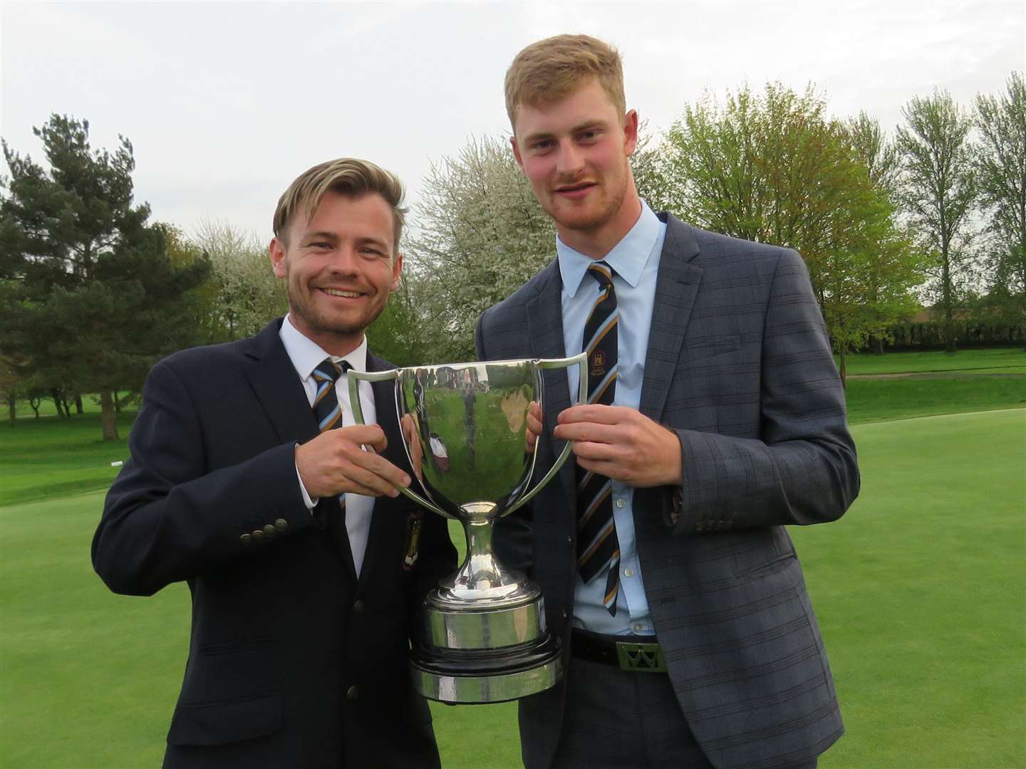 Diss golfers James Biggs (right) and Chris Bartrum with the Suffolk Amateur Foursomes Championship they won for the fourth consecutive year (34590255)