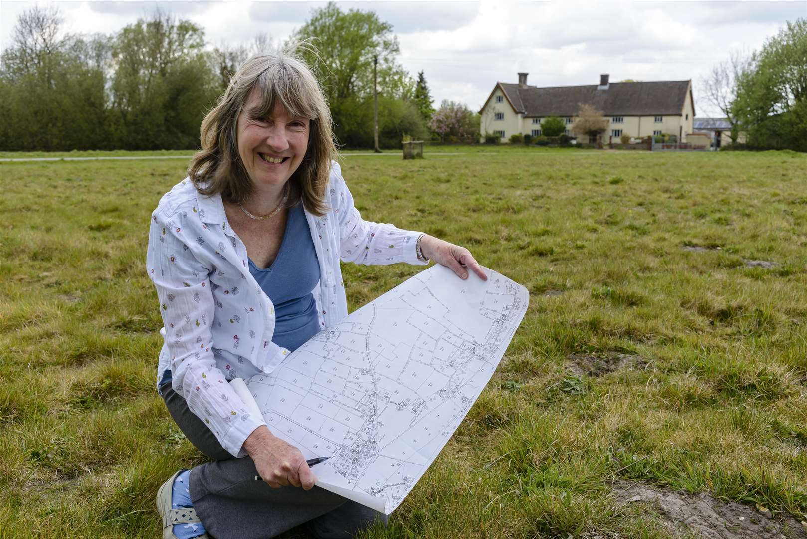 Sue Heaser in front of White House Farm, which was known as Poplar Farm in 1860. Picture by Mark Bullimore.