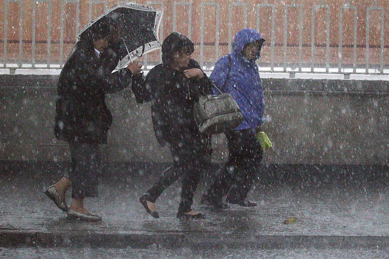 Hail and gusty winds could also be on the way (PA)