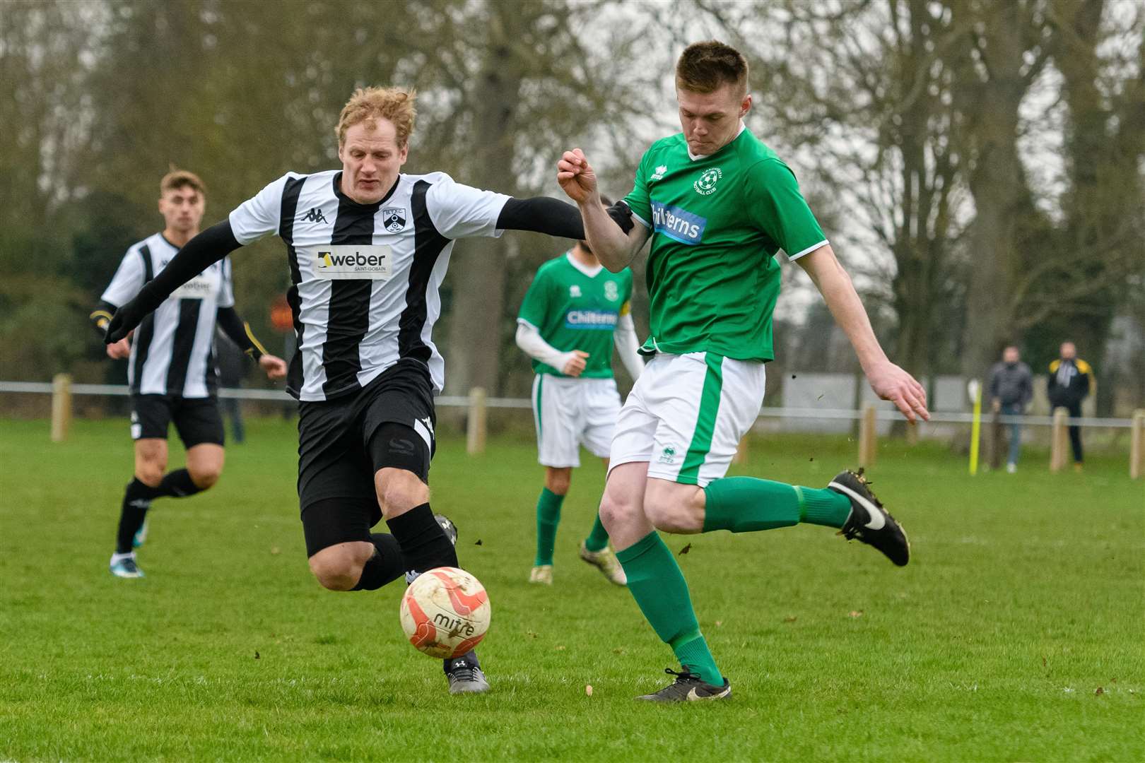 Football action from Harleston v Lakenheath Nathan Stone (H) and Jordan Baker...Picture by Mark Bullimore Photography. (7445949)