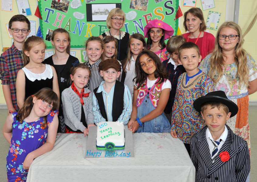Stradebroke Primary School was hosting a celebration for 150 years''Pictured: Teachers and pupils celebrating with a cake ANL-150807-181029009
