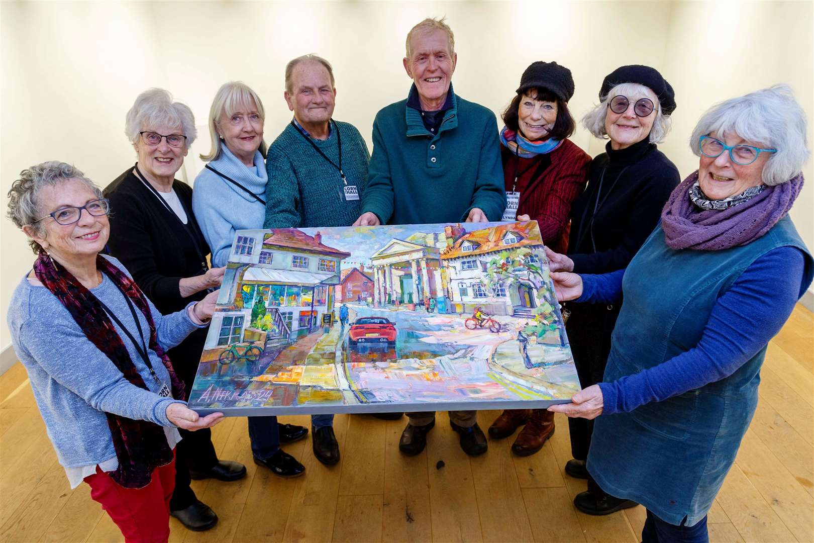 Suzanne Kayne (left) and Jean Grocott (right) display the artwork with some of the other volunteers. Picture: Mark Bullimore