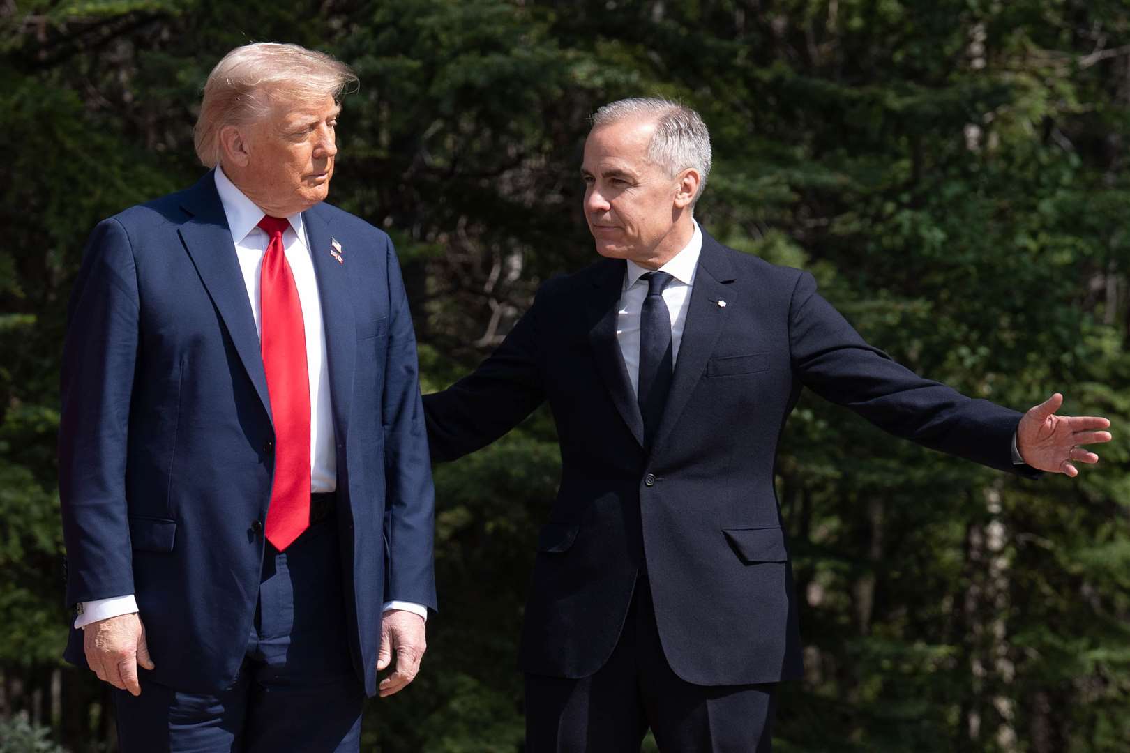 US President Donald Trump poses for a photo with Prime Minister of Canada Mark Carney (Stefan Rousseau/PA)
