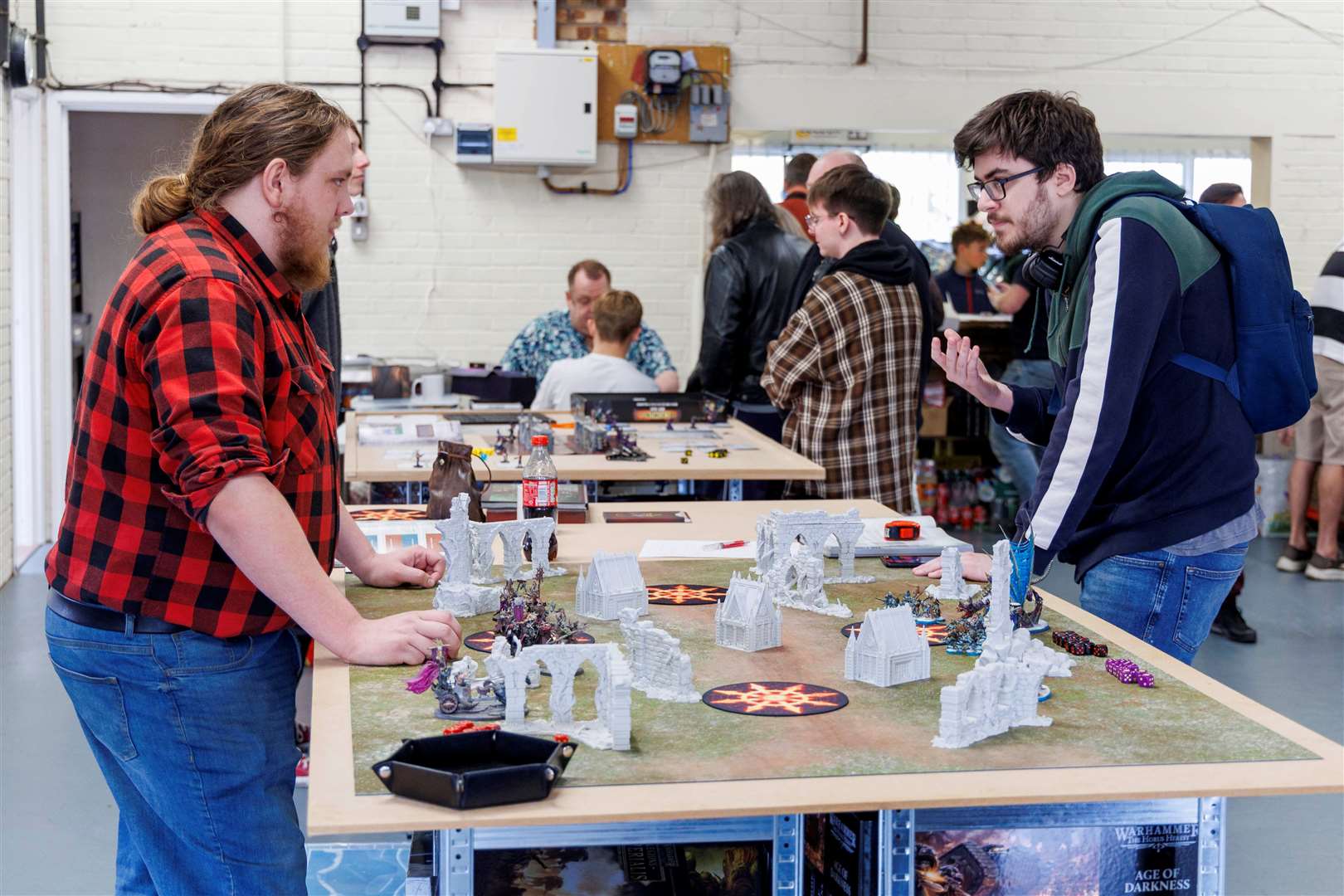 Bailey King and Charlie Matthews playing Age of Sigmar. Picture: Mark Bullimore