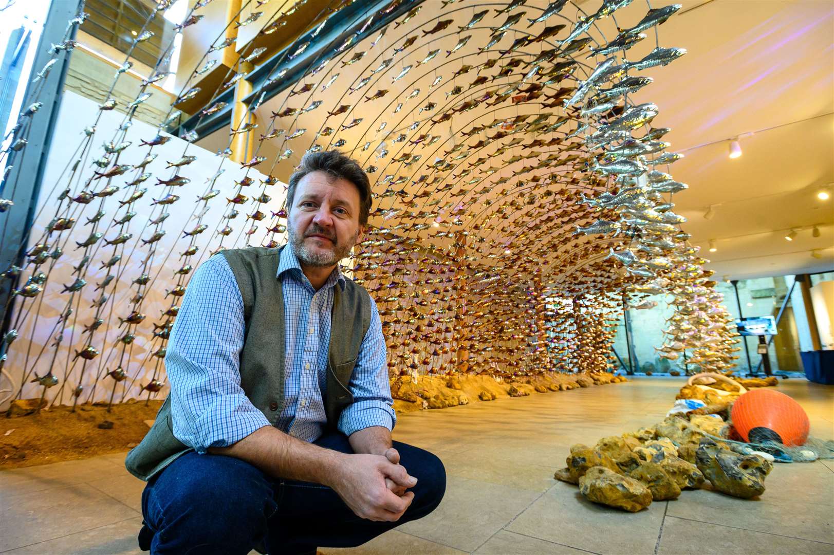 Mark Reed, with his sculpture on display at Norwich Cathedral. Picture: Mark Bullimore Photography 2021.