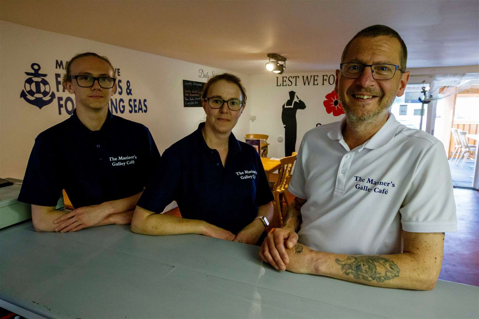 Amy and Glenn Hoddy, with son Ryan Chettle, inside The Mariners Galley Cafe in Rushall. Picture: Mark Bullimore