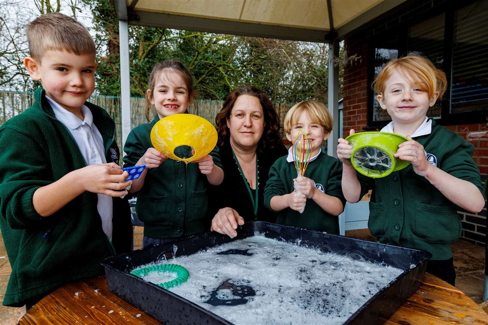 Bubble fun with pupils Vinnie, Mia, Juno and Lara with Mrs Katrina Weatherley. Picture: Mark Bullimore