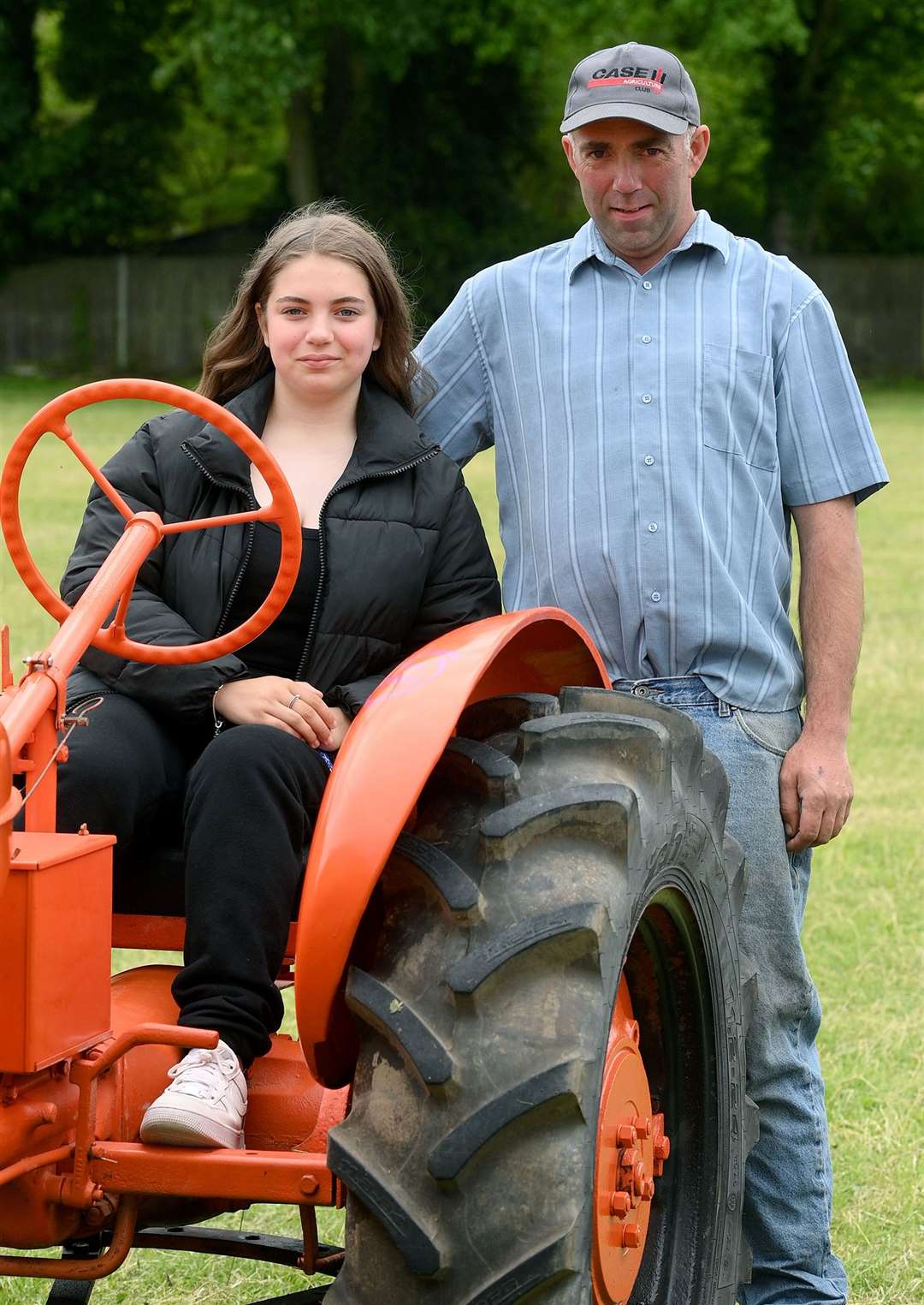 Robert Pratt and daughter Lily, 12, and his 1940 Allis-Chalmers Model B tractor. Picture: Mecha Morton