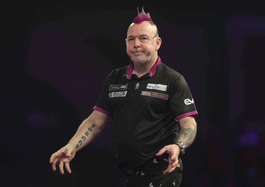 SHOCK DEFEAT: Peter Wright beaten at 2018 World Championship by qualifier (Picture: Lawrence Lustig/PDC)