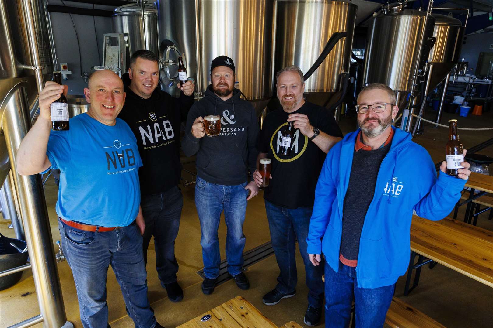 Members of the Norwich Amateur Brewers - Martin Haworth, Richard Dent, Will Gant and Keith Bailey with Andy Hipwell, centre, of Ampersand Brewery. Picture: Mark Bullimore