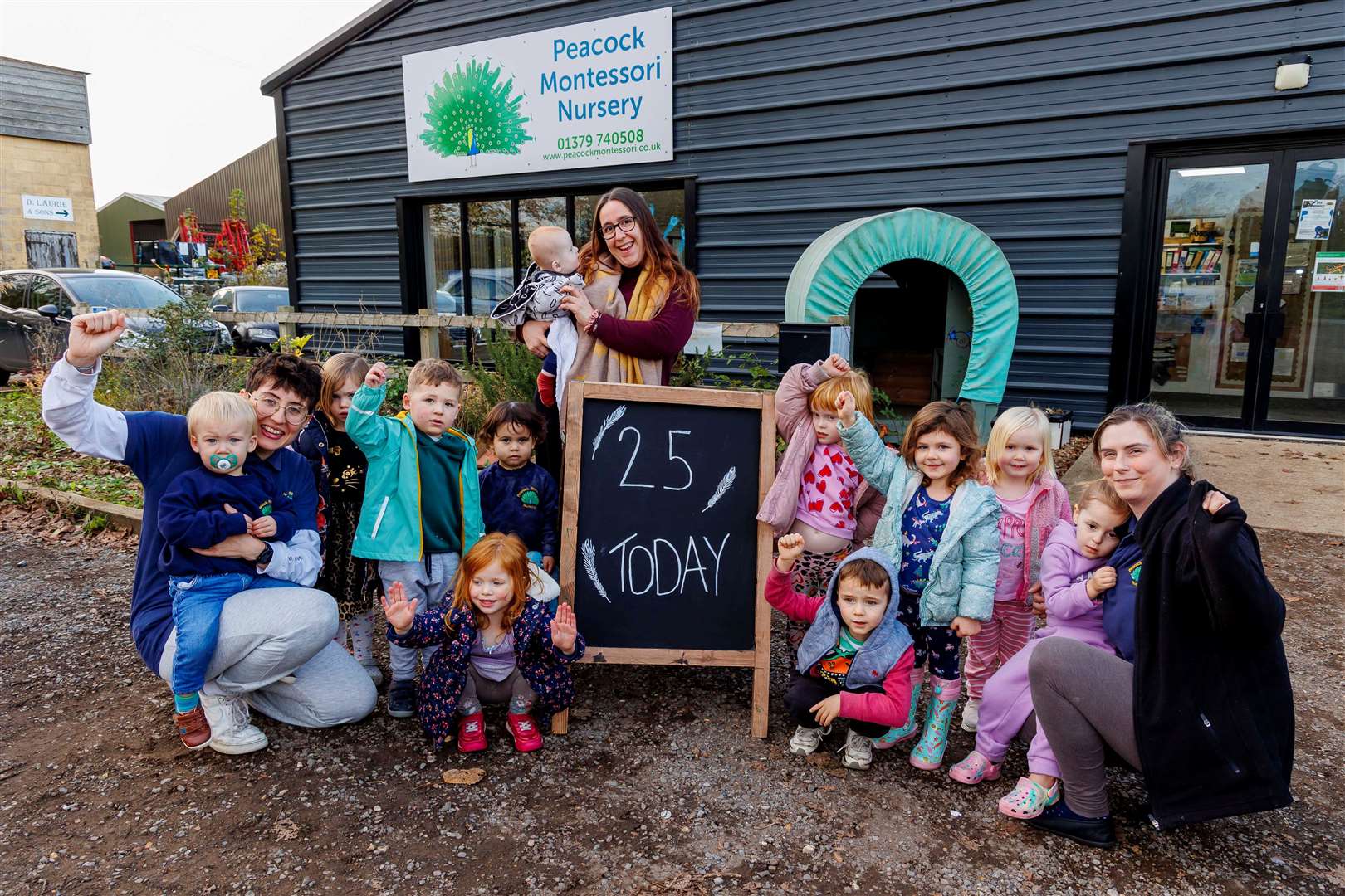 Georgia Deacon, Georgie Carpenter and Rosie Marjoram with some of the children who use the nursery. Picture: Mark Bullimore