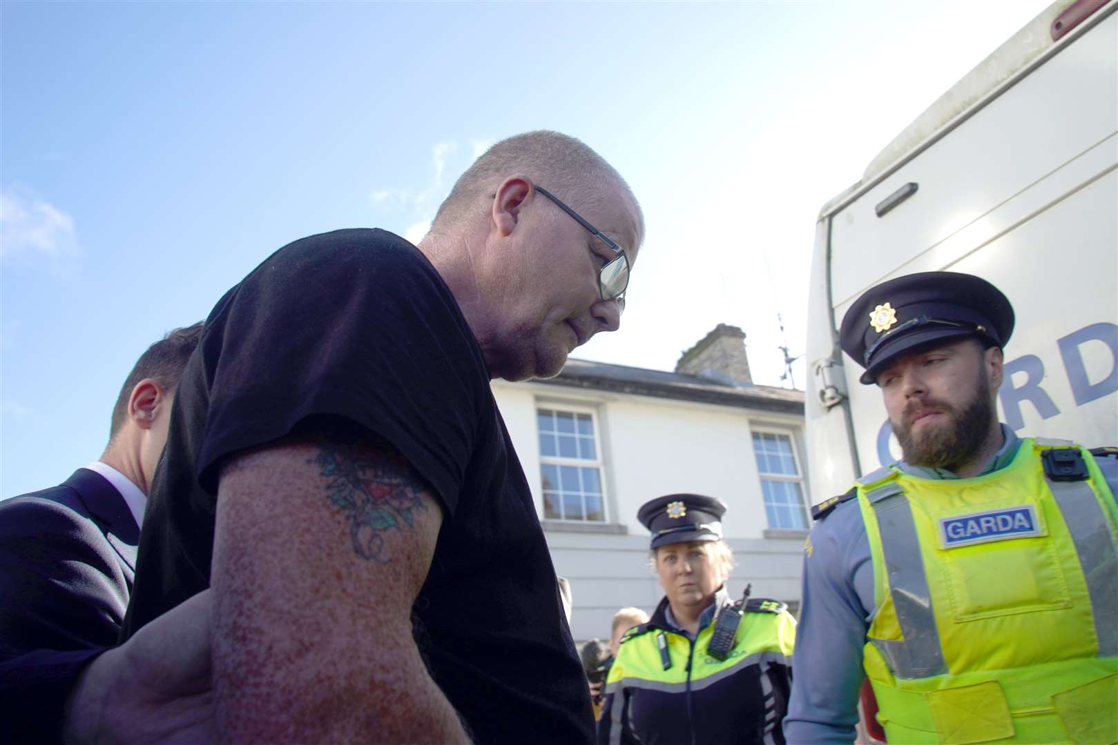 Richard Satchwell leaves the District Court in Cashel, Co Tipperary, after being charged in connection with the murder of his wife Tina Satchwell (Brian Lawless/PA)