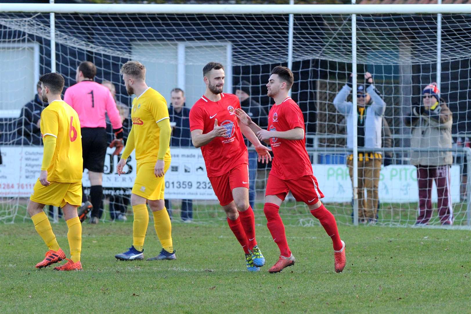 Ryan Clark (far right) celebrates scoring for Stowmarket against Walsham last season, but has returned to the Willows