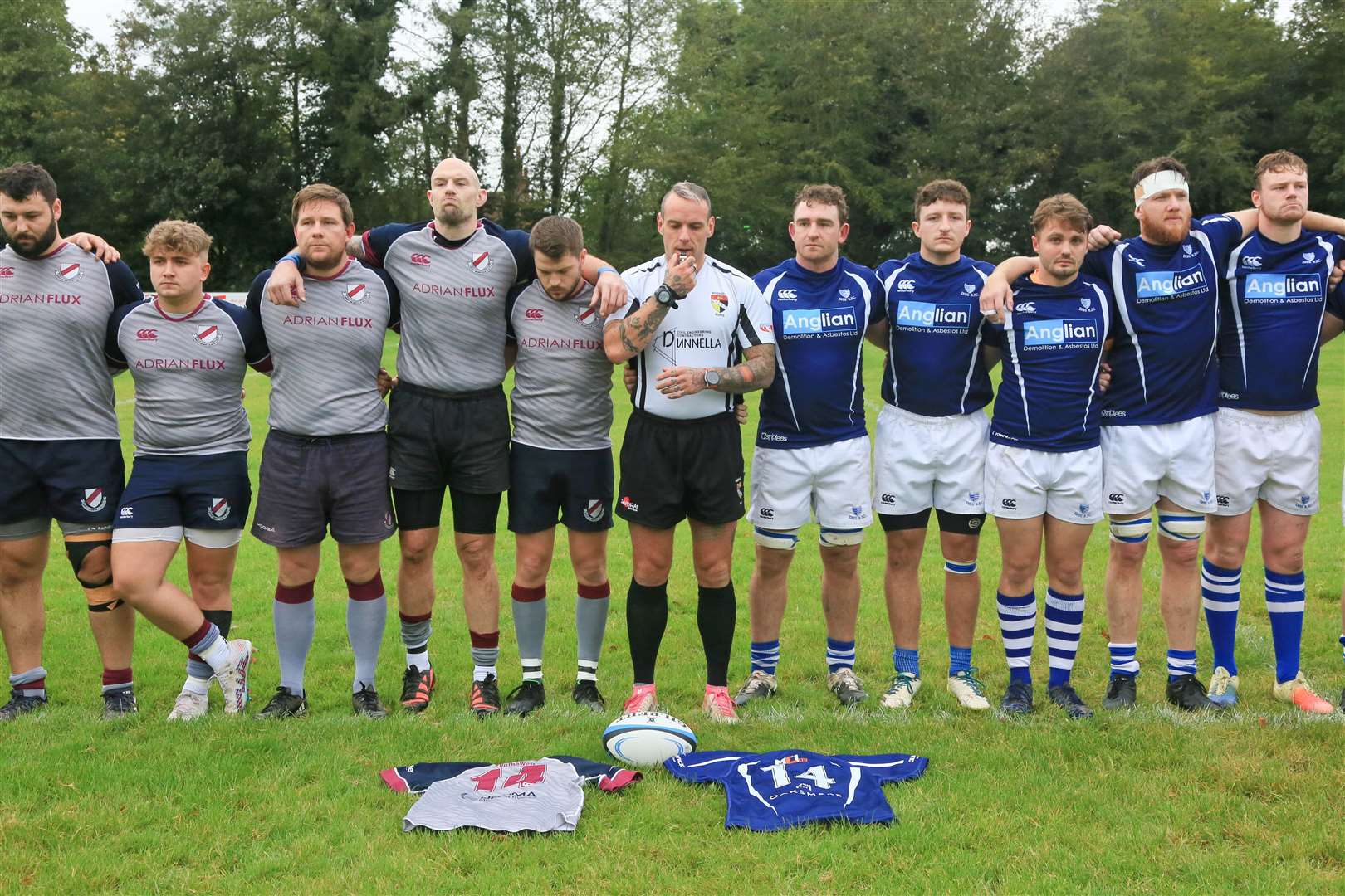 Diss and West Norfolk pay their respects to Arturas Rudys ahead of the hosts prevailing 24-19 Pictures: Gary Donnison