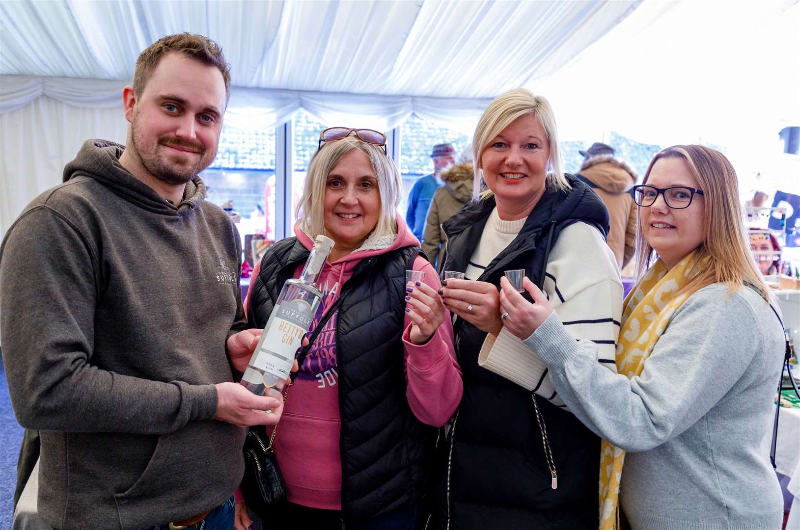 Bressingham, Norfolk, 11/11/2023Bressingham Hall and High Barn - Christmas craft fair. Pictured are Ryan Luke of Heart of Suffolk distillery with Diane Fisk, Natasha Nevitt and Sharon TookePicture: Mark Bullimore Photography 2023