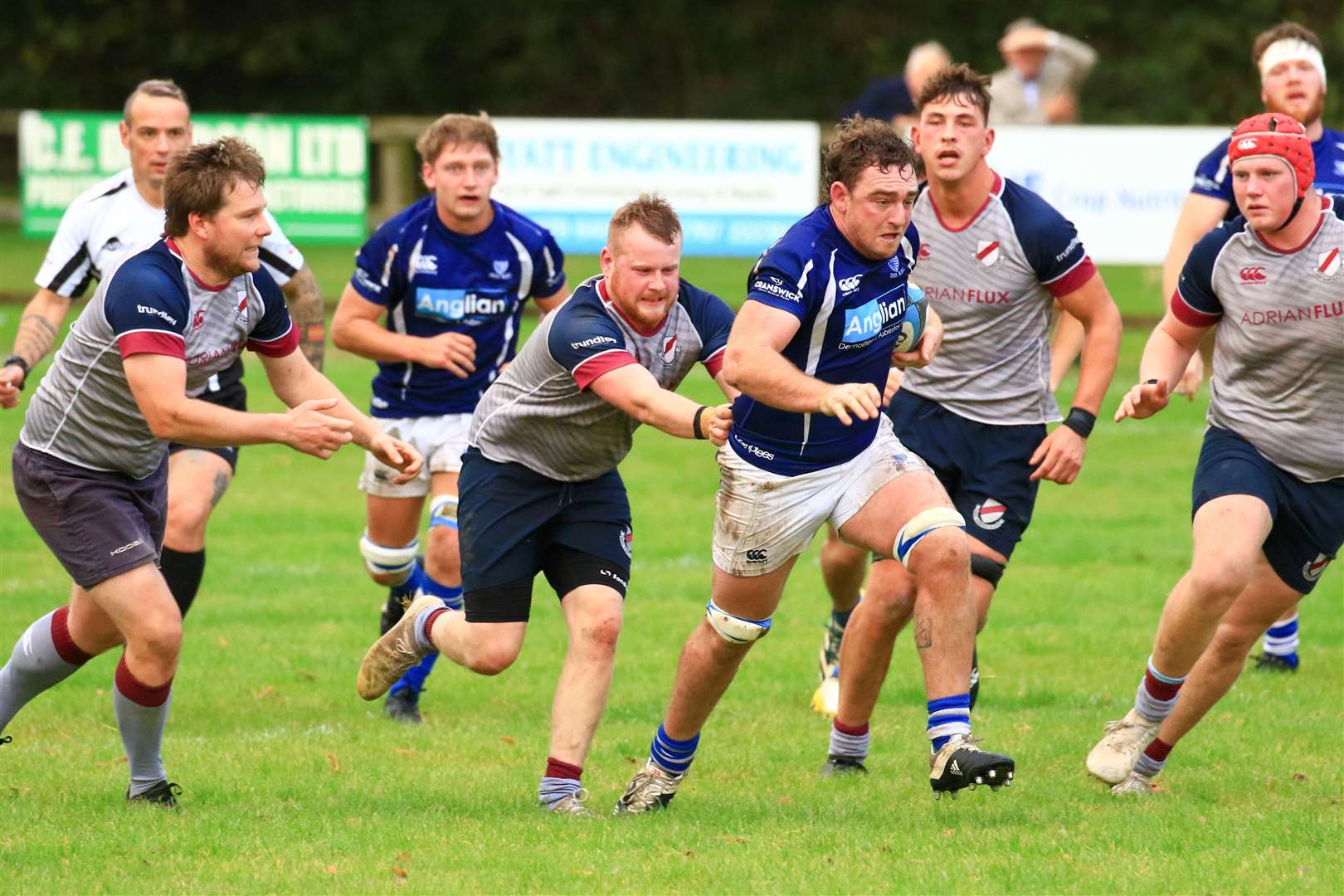 Diss skipper Nick Garnham pushes his side forward Picture: Gary Doninson