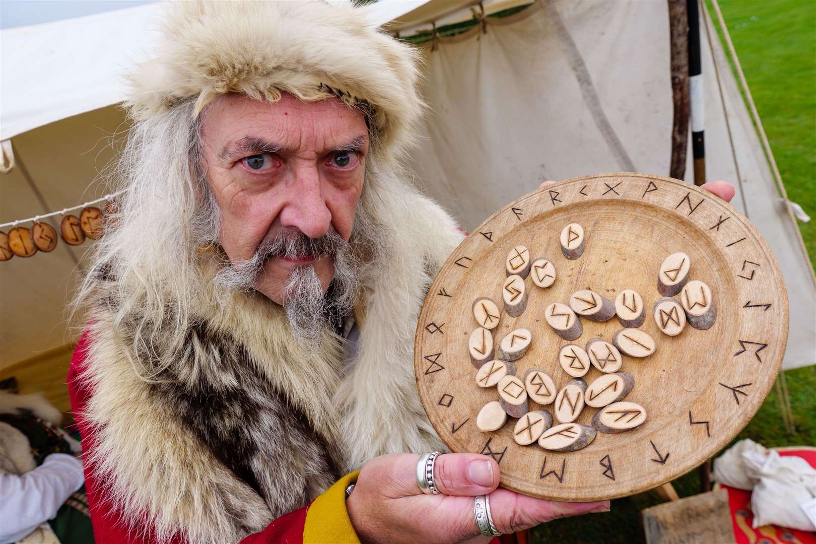 Saxon and Viking Festival at Stonham Barns: Aethelgar the storyteller with his runes.