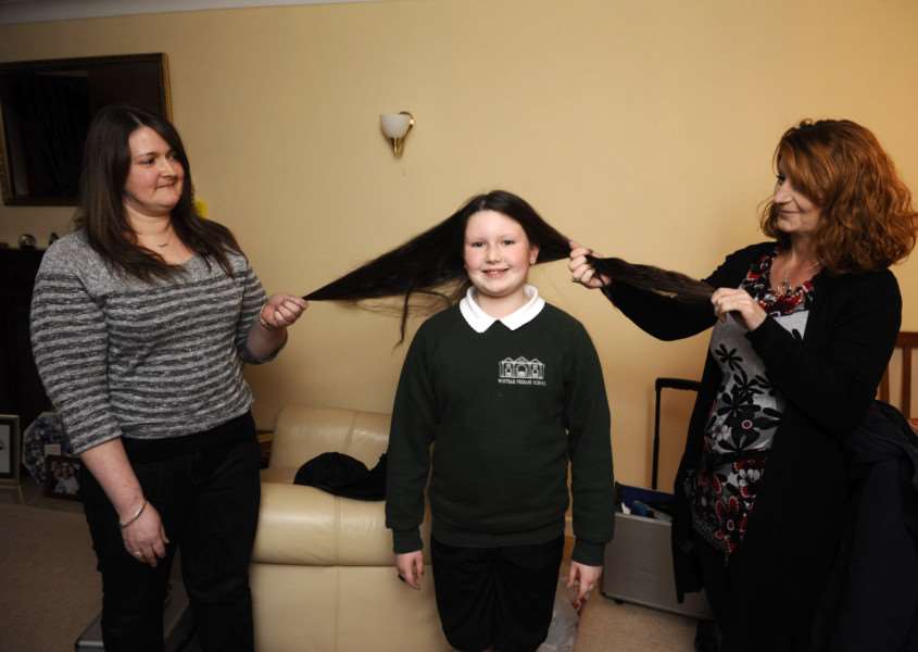 Phoebe Cooper Green having her hair cut shorter for charity. With (i-r) mum Emma nd hair dresser Tracy Jones. ANL-151125-171255005