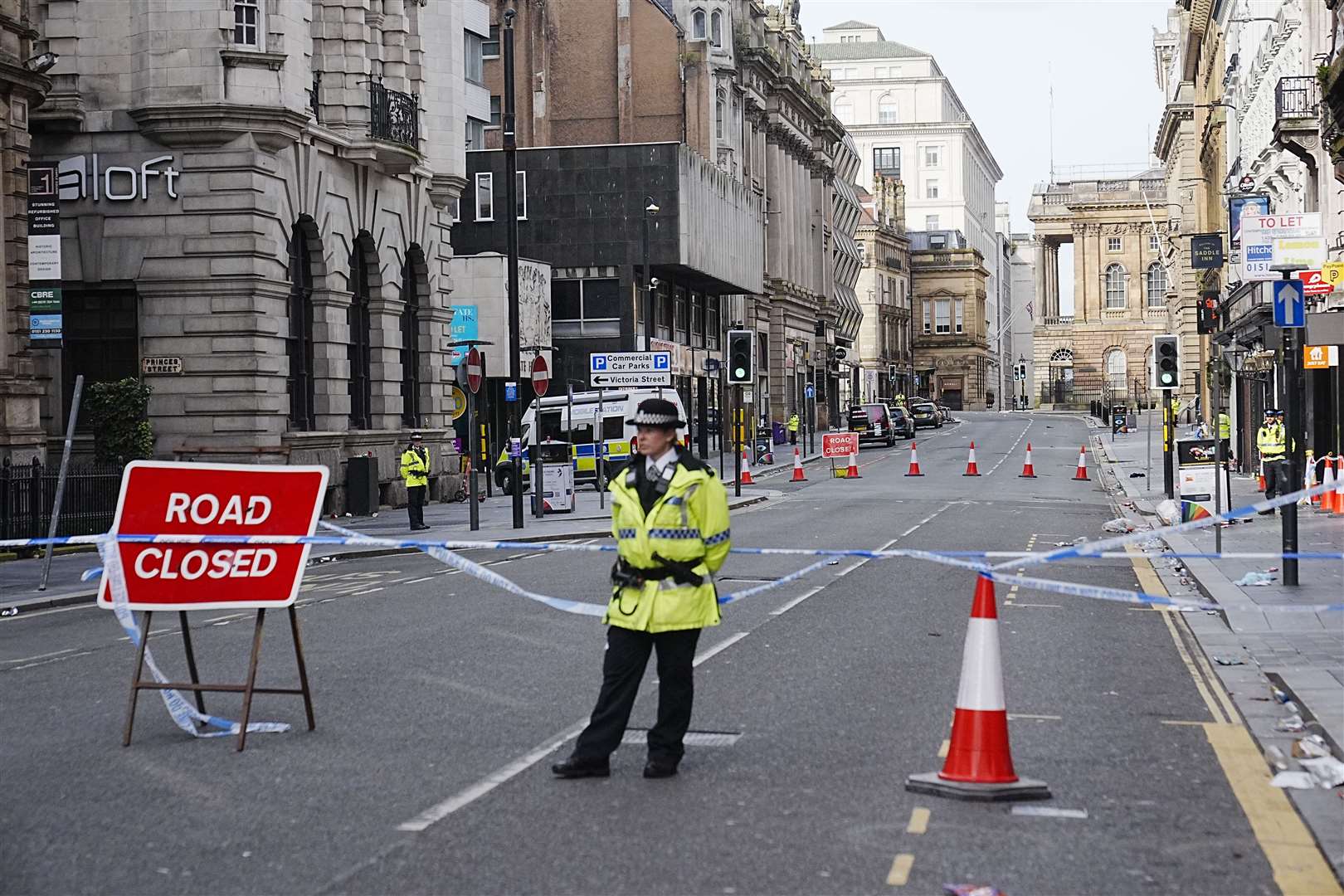 A police officer at the scene in Water Street near the Liver Building in Liverpool (Peter Byrne/PA)