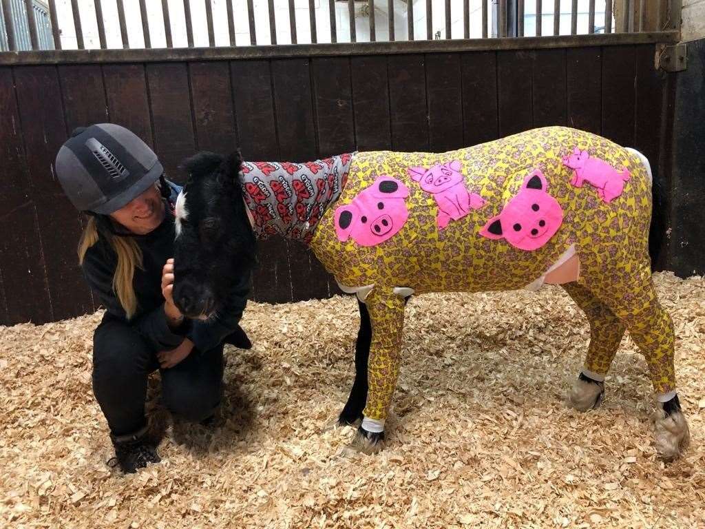 Phoenix in a Pig-inspired wrap. (52140650)