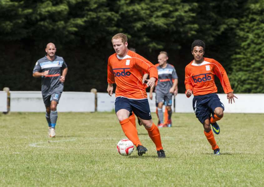 UNFINISHED BUSINESS: Adam Burroughs, pictured before sustaining a hamstring injury against Norwich United, says he is back at Diss Town with a point to prove .