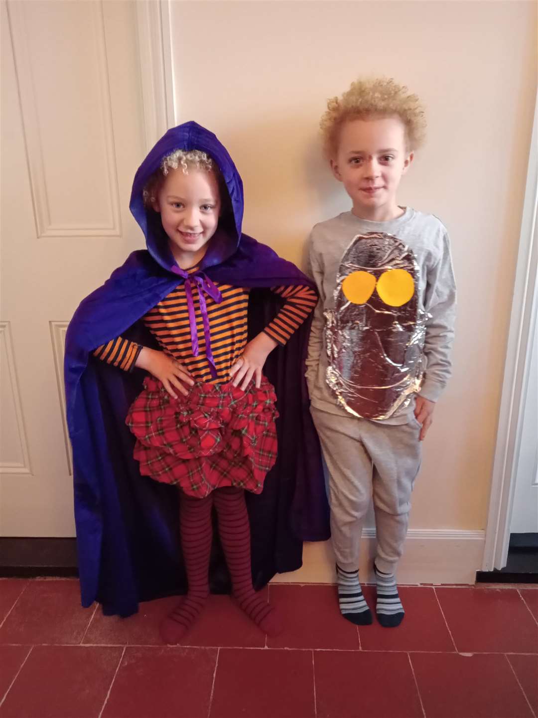 Arthur, seven, as a robot from his favourite book The Wild Robot and Ivy, six, as Goth Girl from the book Goth Girl.