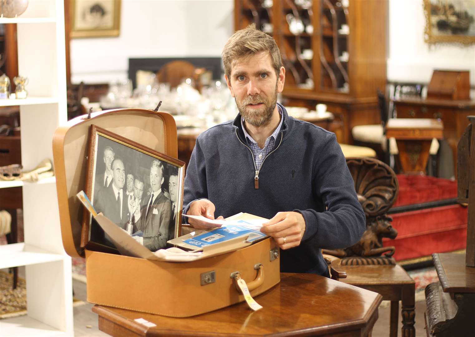 TW Gaze's book expert, Robert Henshilwood, with the Sir Alf Ramsay suitcase. Pictures: TW Gaze