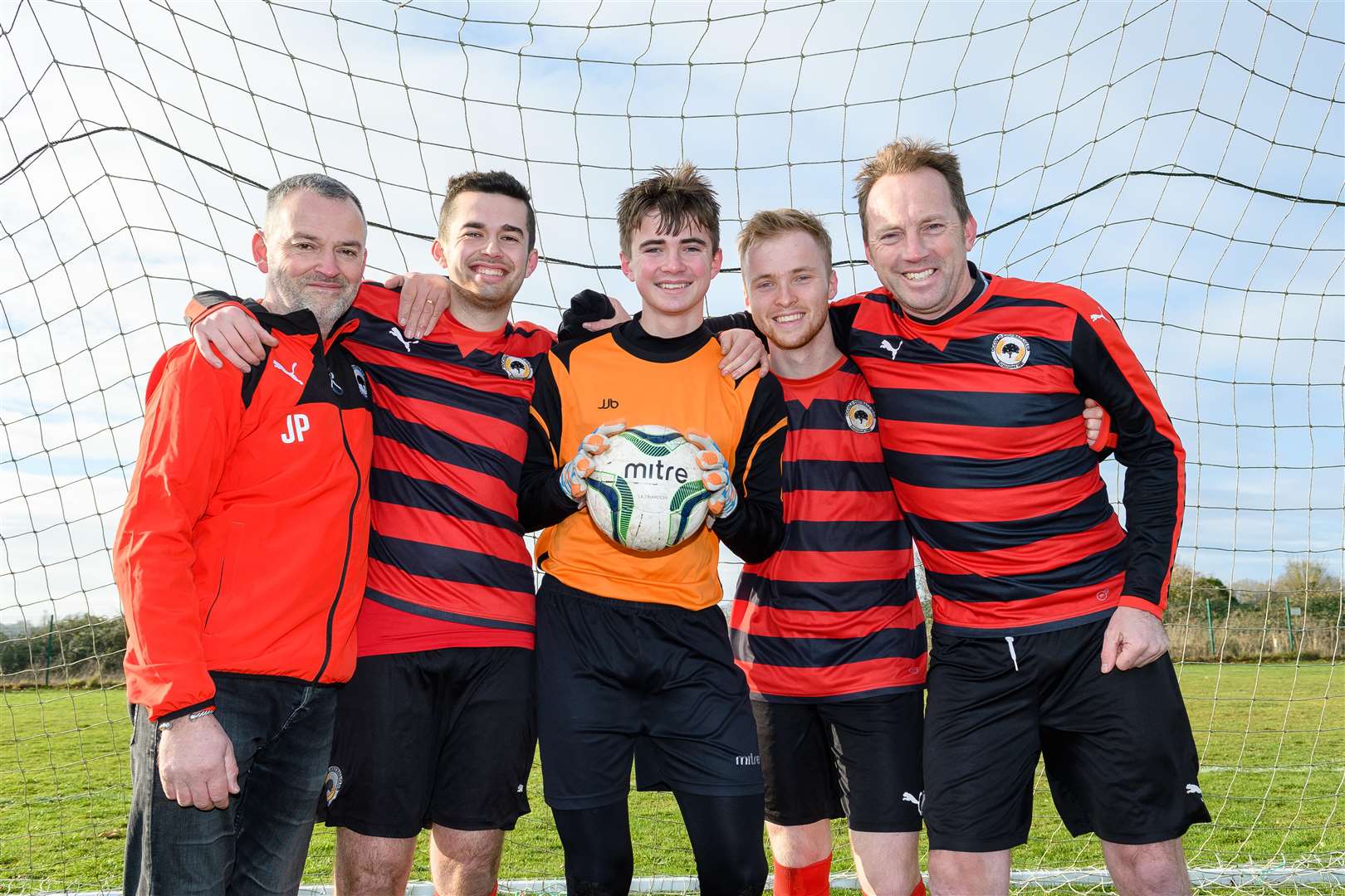 Two 51 year old fathers, one the manager with their sons who play for Occold FC pictured from left James and Isaac Plummer with Harry, George and Dave Green..Picture by Mark Bullimore Photography. (6622491)