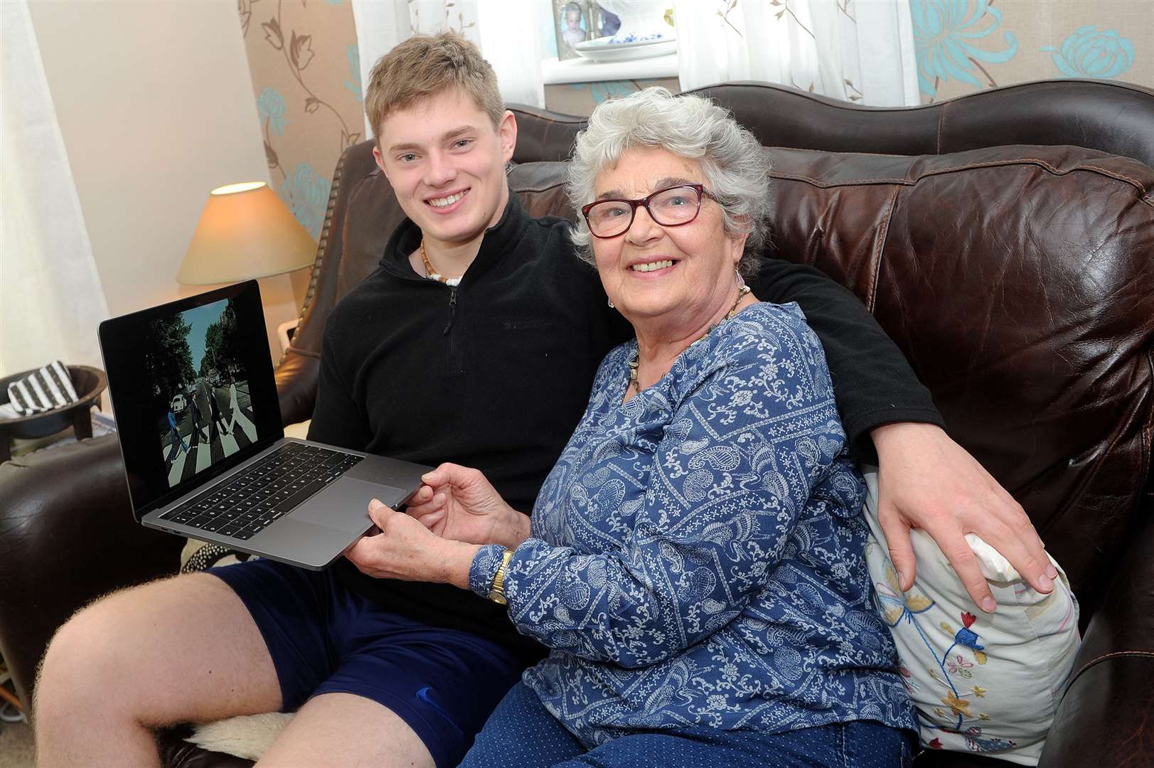 Iris with grandson Oscar check out The Beatles at home
