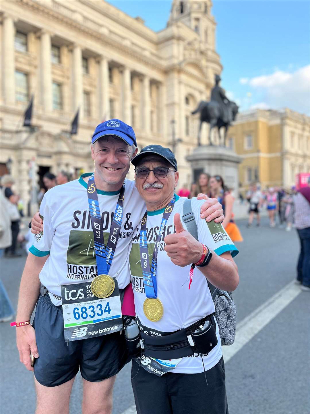We did it: Simon Shercliff and Anoosheh Ashoori.at the finish line. Picture Contributed