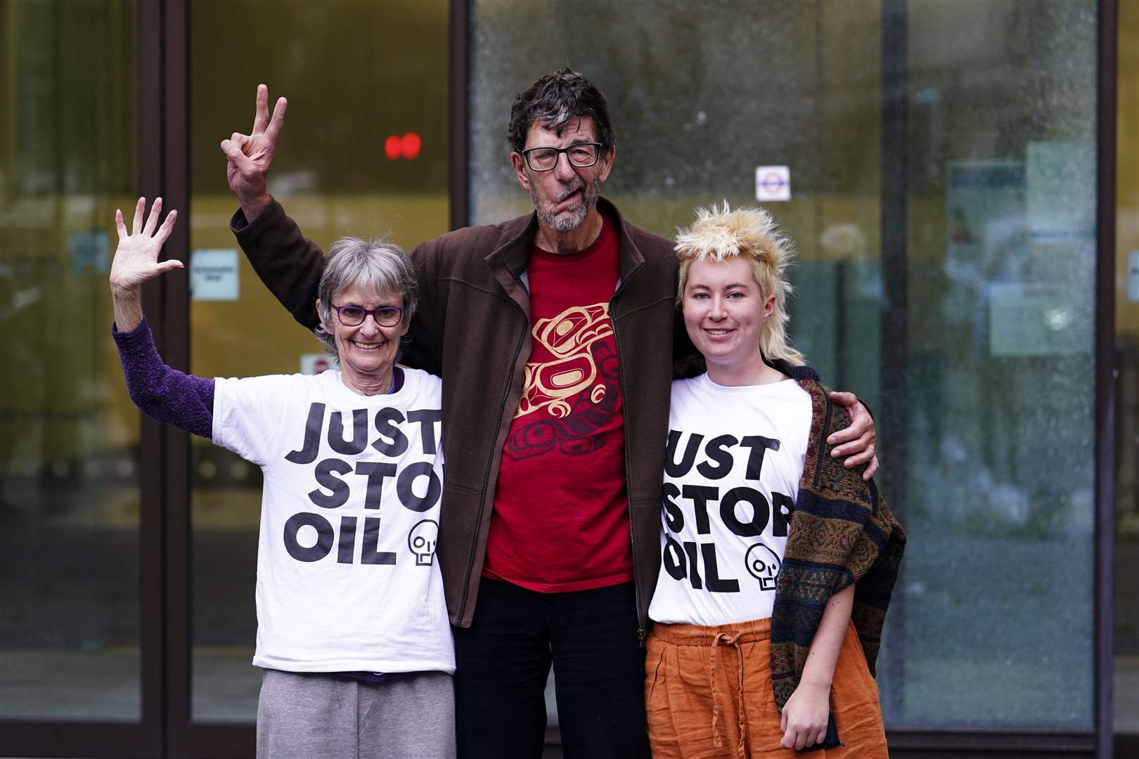 (L to R) Just Stop Oil activists Mary Somerville, Stephen Simpson and Phillipa Green leave Westminster Magistrates’ Court following a hearing at the end of September (Jordan Pettitt/PA)