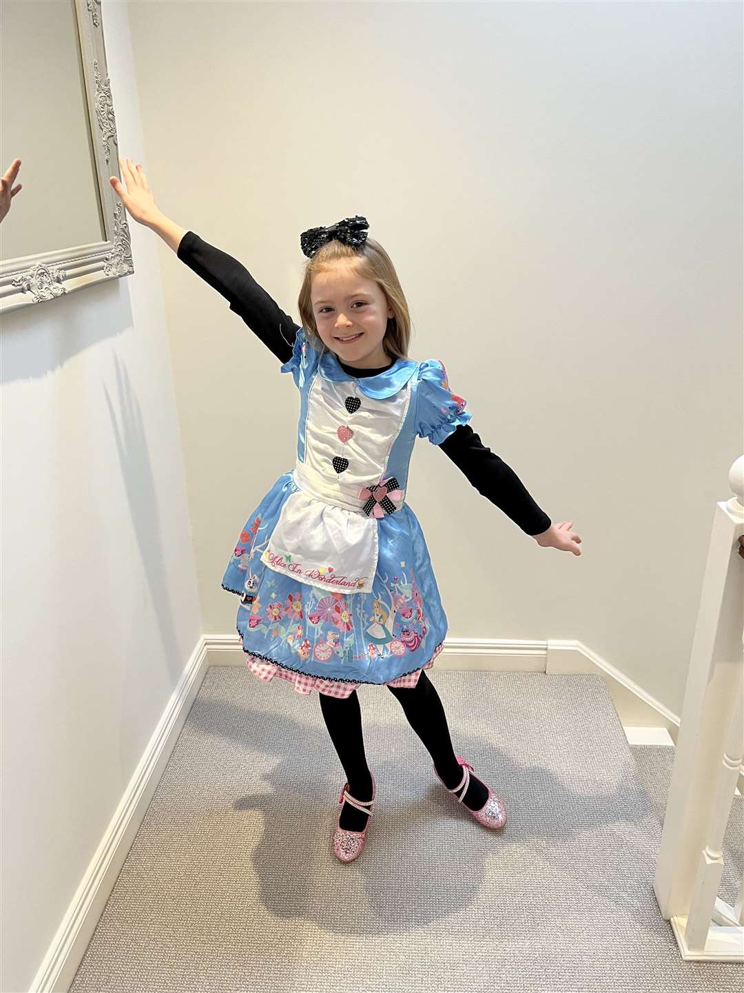 Hetty Seaman, eight, as Alice from Alice in wonderland.