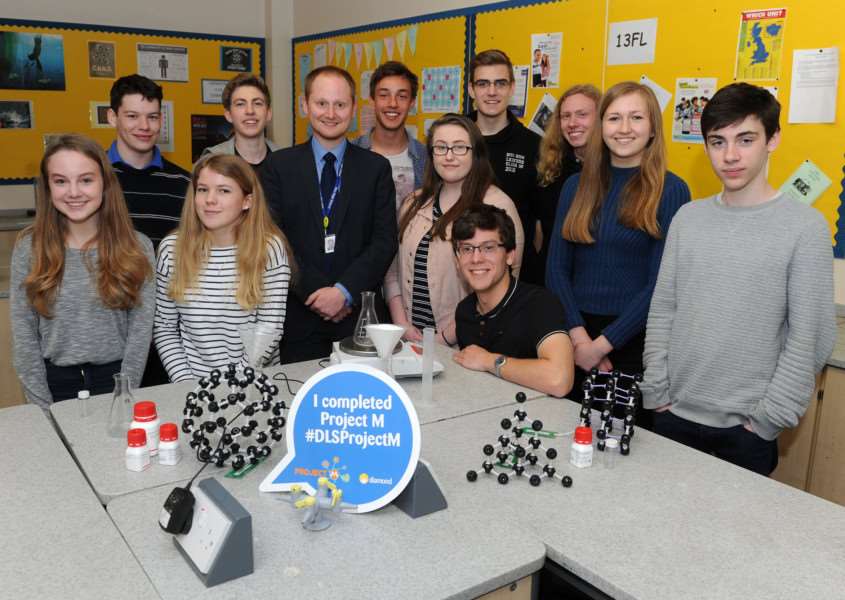 Year 12 Chemistry students at Diss High School have contributed samples towards a major experiment by leading UK science facility Diamond Light Source. Pictured: Students and Francis Lemon, Head of Chemistry. PICTURE: Mecha Morton
