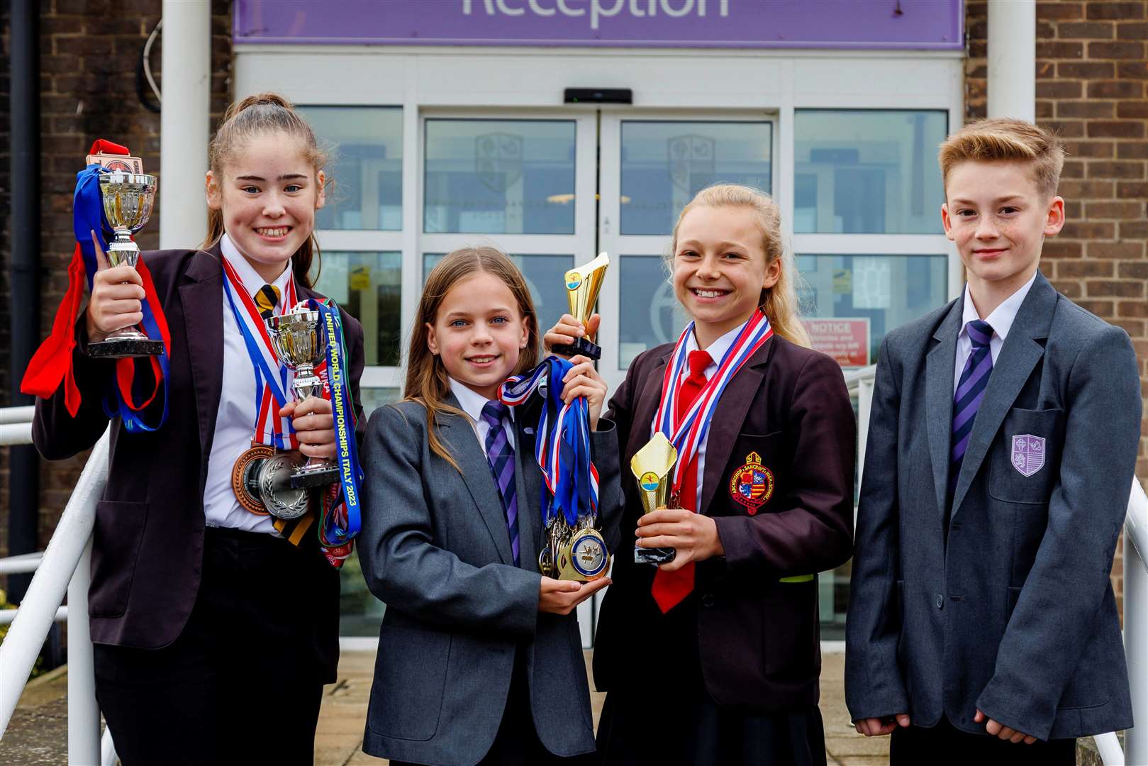 Harleston, Norfolk, 01/11/2023Harleston Sancroft Academy pupils with some of the medals and awards they’ve won for Gymnastics and Karate, pictured fro left Scarlett Chenery, Lilly-Mae Partridge, Elizabeth Gray and Rhys Midwinter.Picture: Mark Bullimore Photography 2023