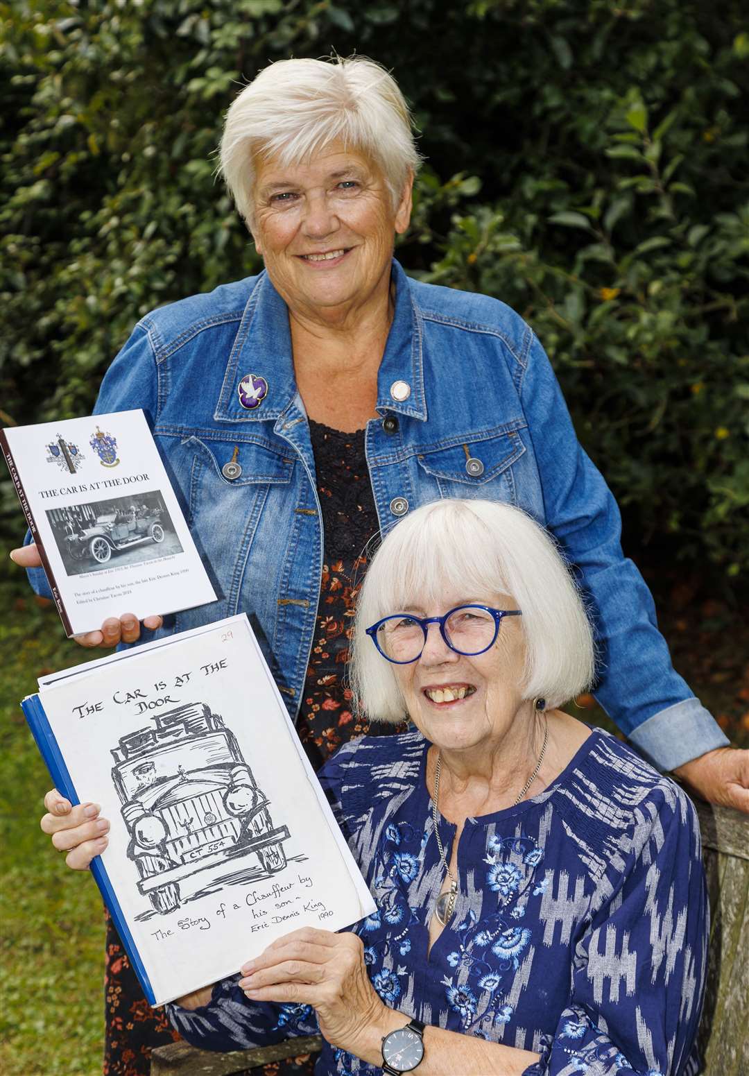 Joyce Cooper (left) and Christine Cooper with the book about their grandfather. Picture: Mark Bullimore