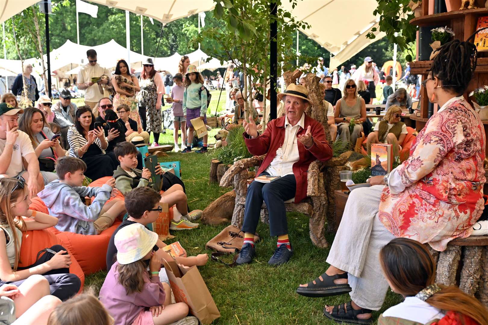 Author Sir Michael Morpurgo gives a talk to guests in literary corner (Jas Lehal Media Assignments/PA)