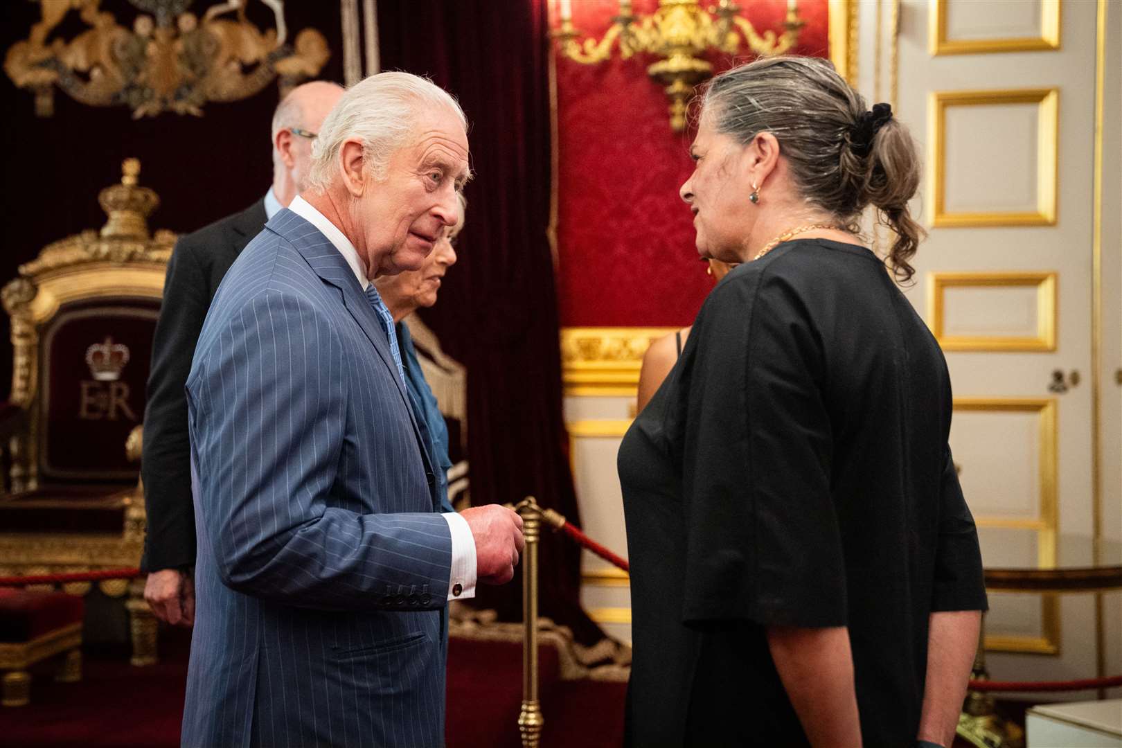 King Charles speaks with Tracey Emin during the reception (James Manning/PA)
