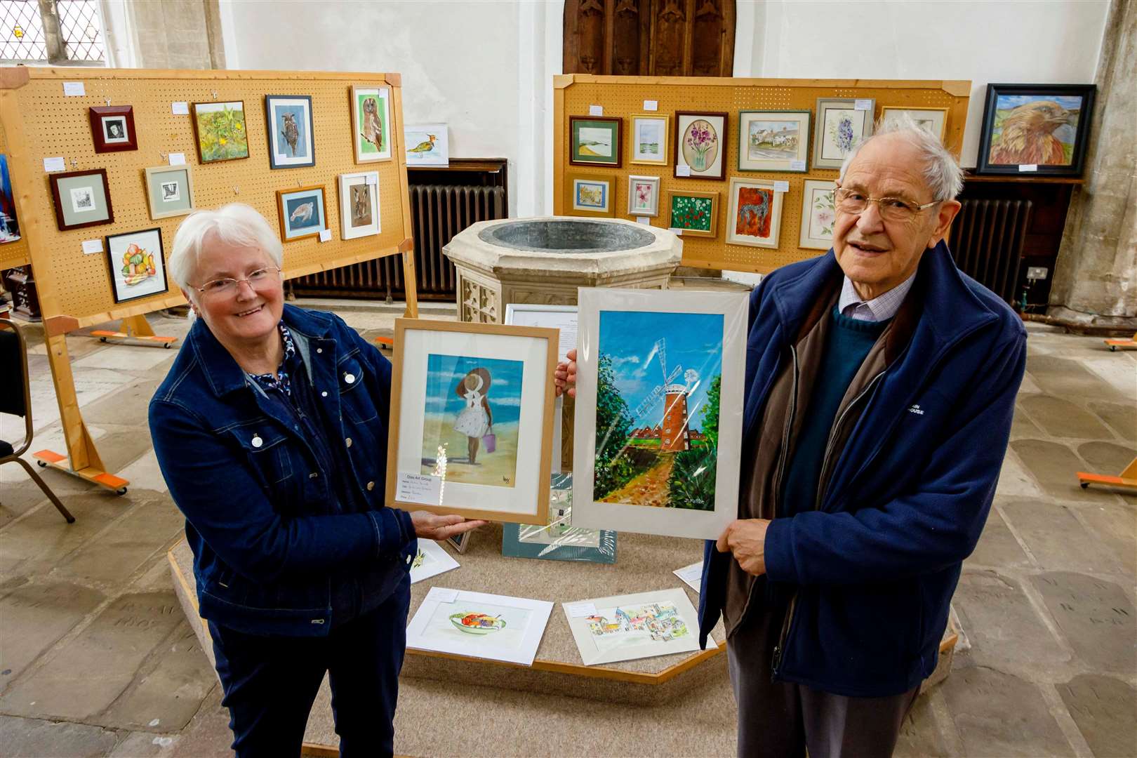 Avril Young and Derek Potter with some of their artwork. Picture: Mark Bullimore