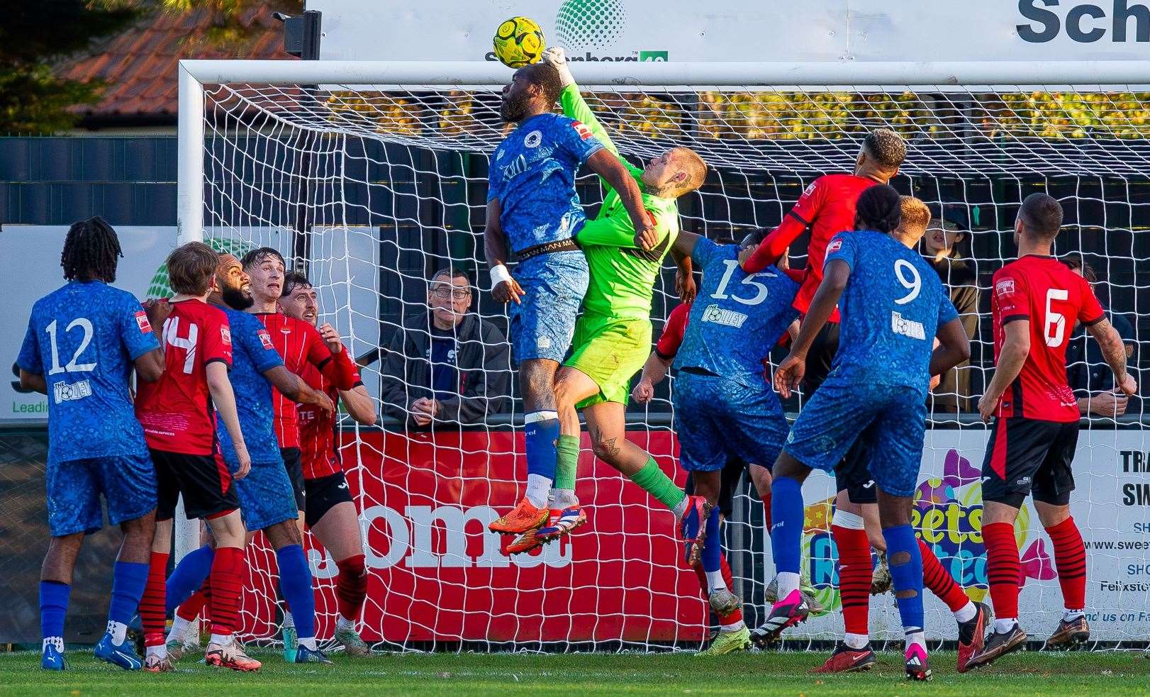 Felixstowe & Walton United goalkeeper Harry Wright clears from a corner at the Martello Ground, Felixstowe against Walthamstow Picture: Stefan Peck