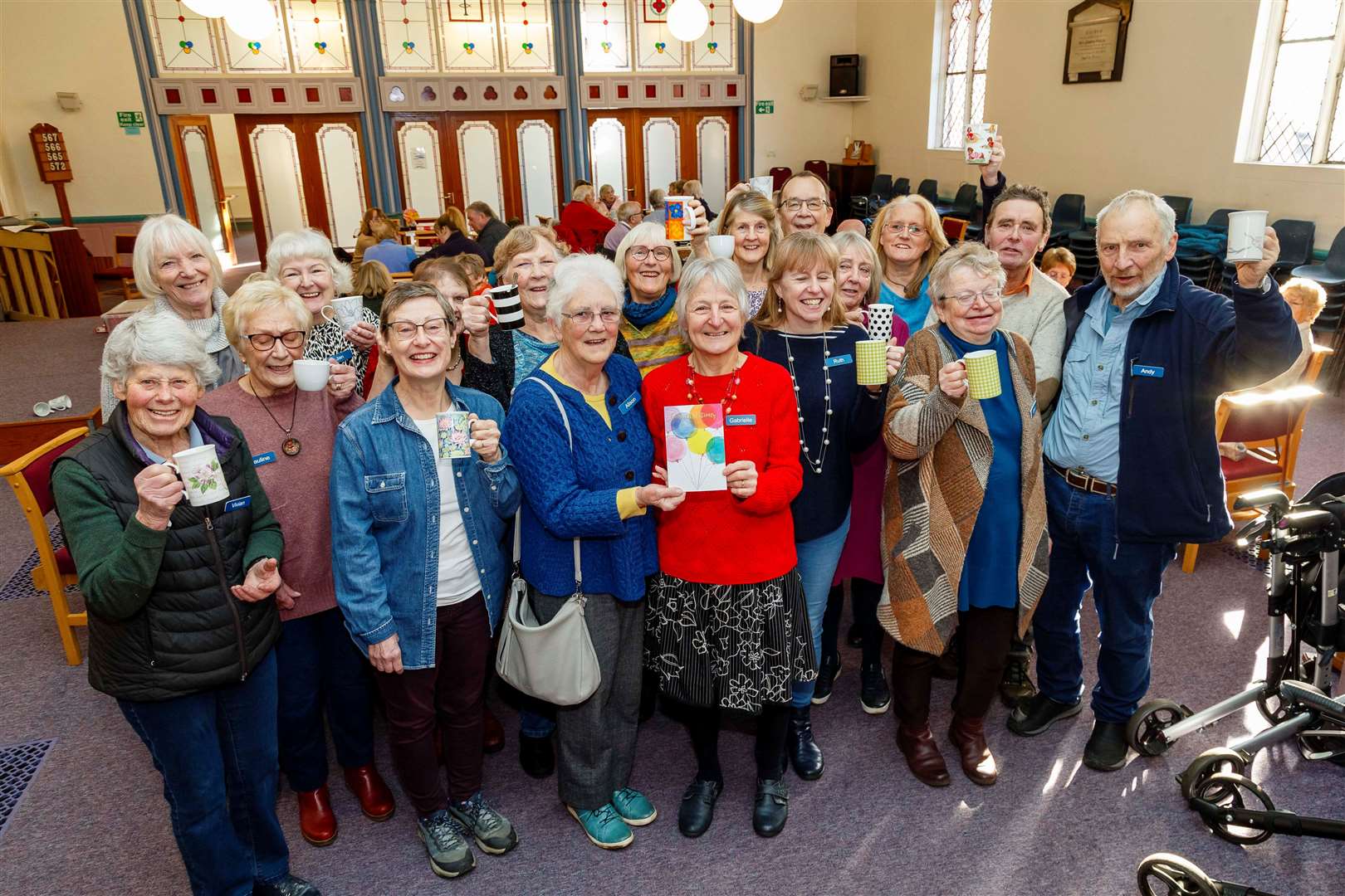 Founders Alison Bannister and Gabrielle Pagan (centre) with cafe members. Picture: Mark Bullimore