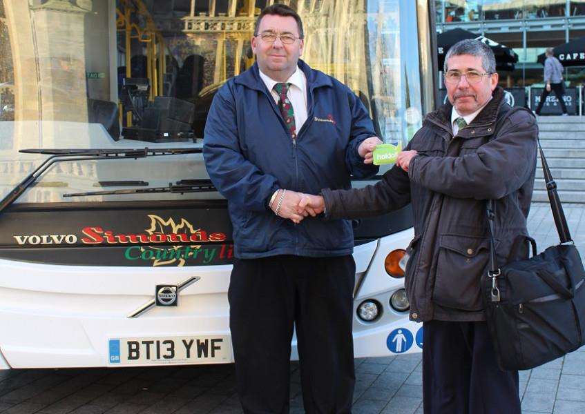 Carl Lummis, left, of Simonds, with Laurie Egan Norfolk County Council's Travel Systems Manager ANL-151231-141841001