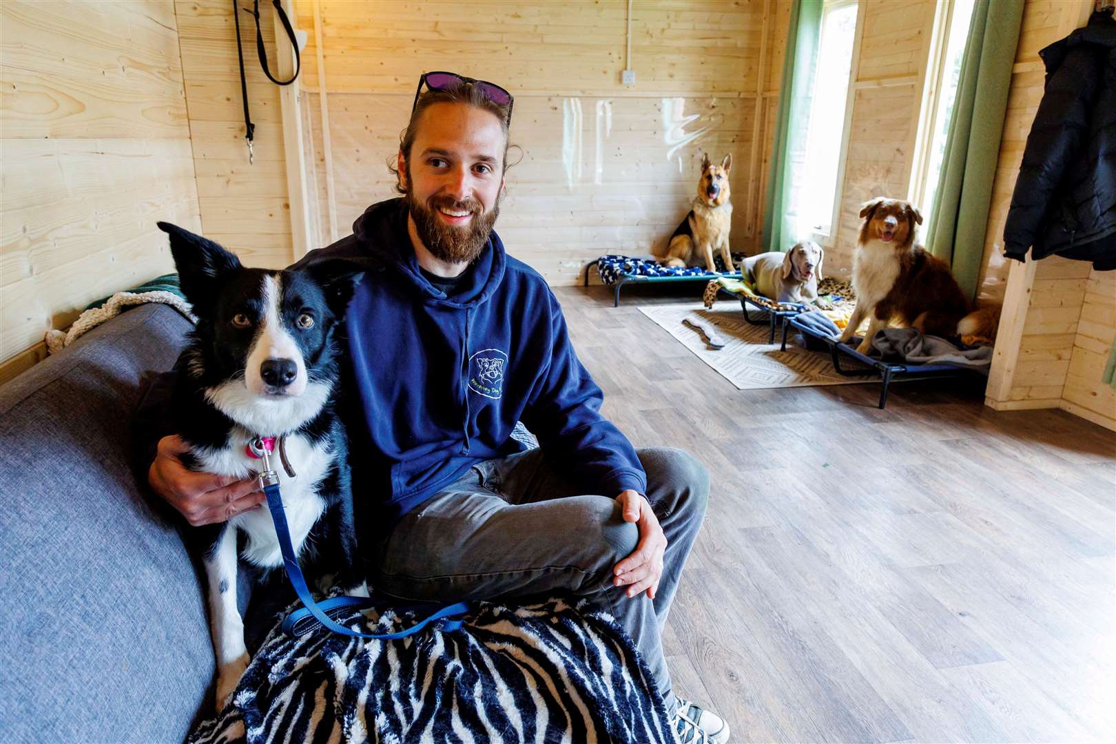 Sam Davey-Smith of Waveney Dog Retreat, pictured here with his dog, Trigger. Picture: Mark Bullimore